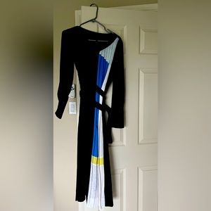 Beautiful long sleeve elegant dress with leather belt around the waist